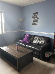 New Milford office with sofa and toys